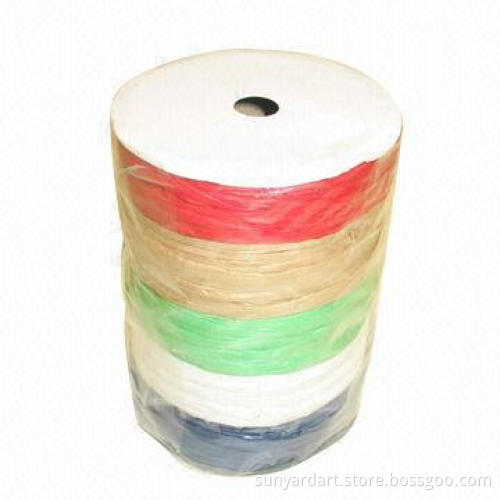 Paper raffia ribbon on paper spool/string